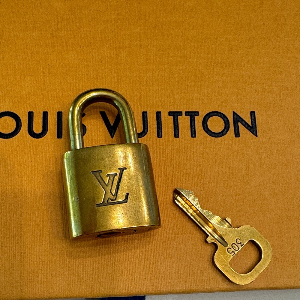 Louis Vuitton Gold Padlock and Key Set